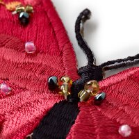 Applikation Schmetterling exklusiv rot mit Perlen