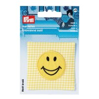 Applikation Smiley auf gelbem/weißem Stoff