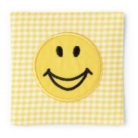 Applikation Smiley auf gelbem/weißem Stoff